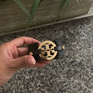 Tory Burch black leather snap bracelet.